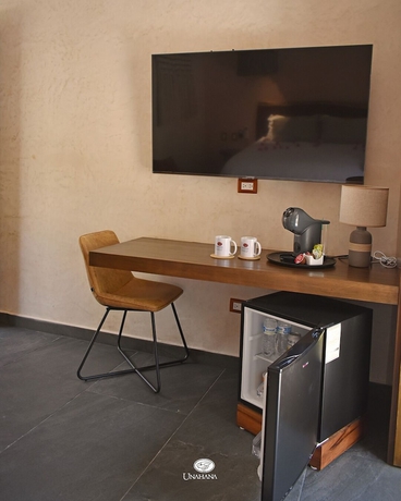 Imagen de la habitación del Hotel Unahana Boutique and villas. Foto 12