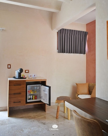 Imagen de la habitación del Hotel Unahana Boutique and villas. Foto 15