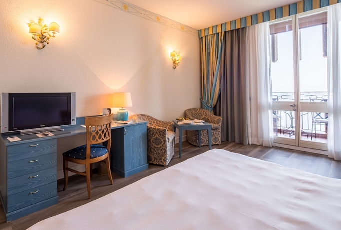 Imagen de la habitación del Hotel Unahotels Capotaormina. Foto 9