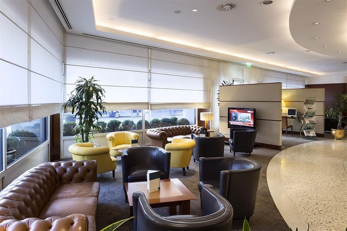 Imagen del bar/restaurante del Hotel Unahotels Cusani Milano. Foto 3