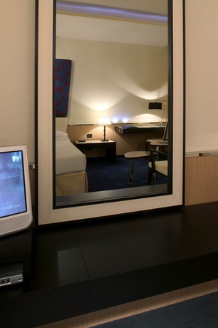 Imagen de la habitación del Hotel Unahotels Malpensa. Foto 12