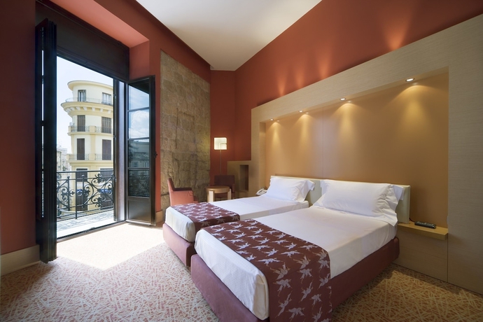 Imagen de la habitación del Hotel Unahotels Napoli. Foto 15