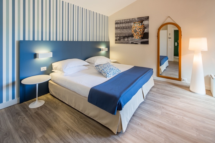 Imagen de la habitación del Hotel Unahotels Naxos Beach Sicilia. Foto 13