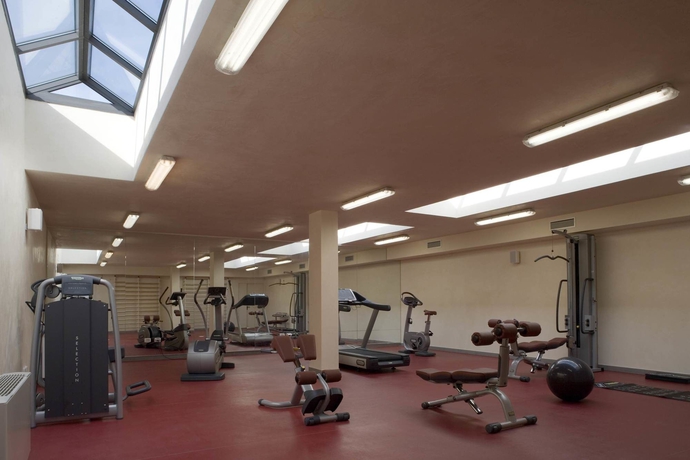 Imagen de los interiores del Hotel Unahotels Poggio Dei Medici Toscana. Foto 16