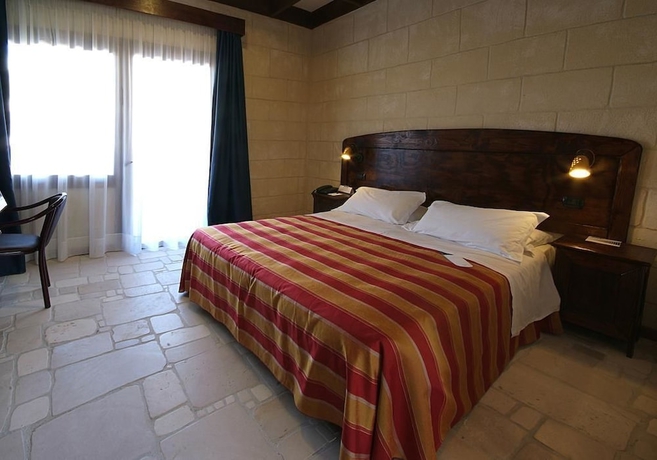 Imagen de la habitación del Hotel Unahotels Regina Bari. Foto 4