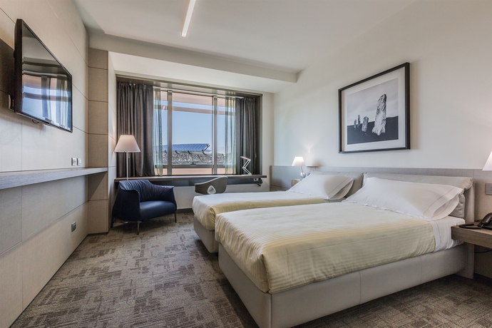 Imagen de la habitación del Hotel Unahotels San Vitale Bologna. Foto 16