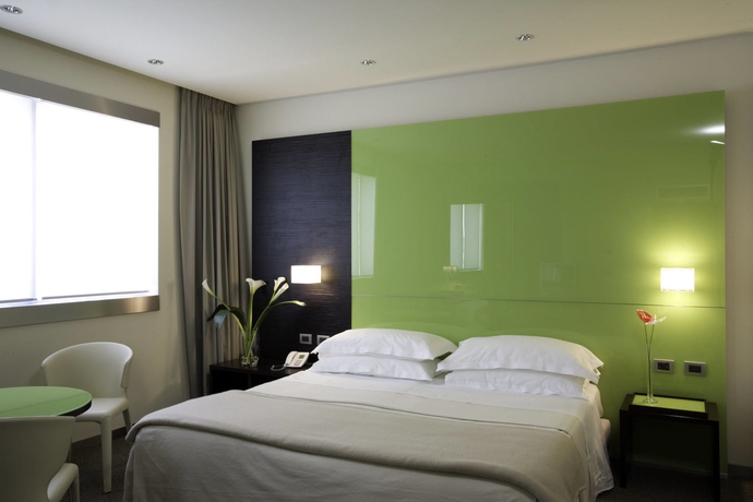 Imagen de la habitación del Hotel Unahotels T Cagliari. Foto 4