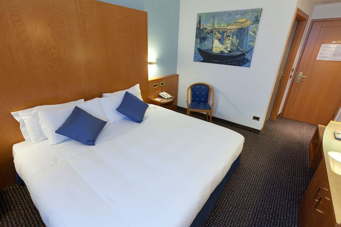 Imagen de la habitación del Hotel Unaway Occhiobello. Foto 16