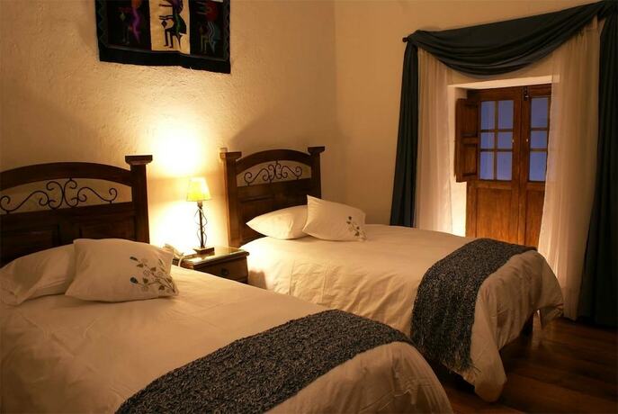 Imagen de la habitación del Hotel Unaytambo Boutique. Foto 17
