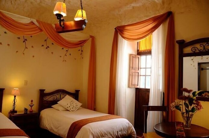 Imagen de la habitación del Hotel Unaytambo Boutique. Foto 26