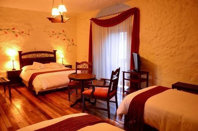 Imagen de la habitación del Hotel Unaytambo Boutique. Foto 27