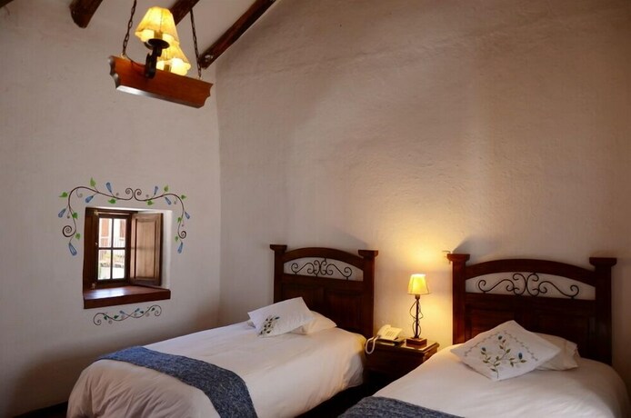 Imagen de la habitación del Hotel Unaytambo Boutique. Foto 28