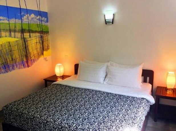 Imagen de la habitación del Hotel Uncle Sam Villa. Foto 19