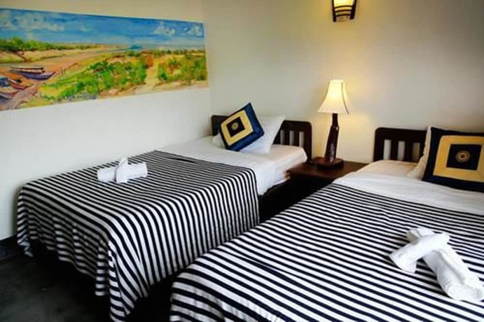 Imagen de la habitación del Hotel Uncle Sam Villa. Foto 21