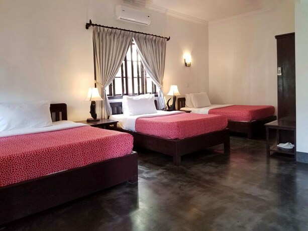 Imagen de la habitación del Hotel Uncle Sam Villa. Foto 24