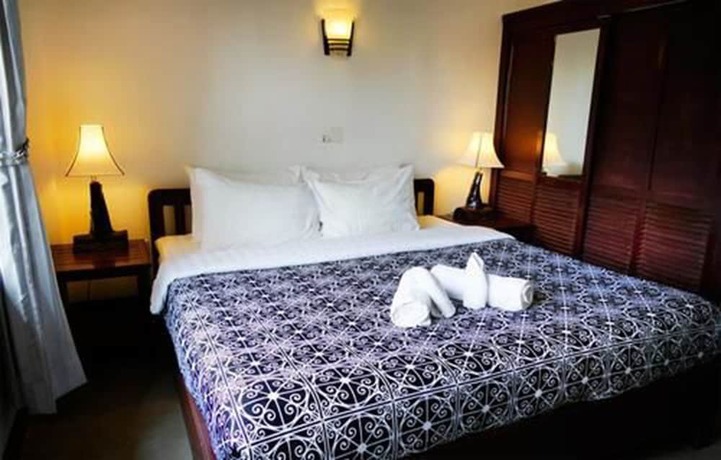 Imagen de la habitación del Hotel Uncle Sam Villa. Foto 25