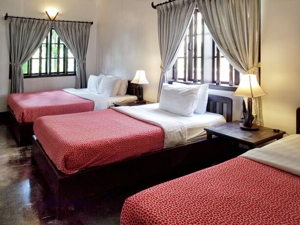 Imagen de la habitación del Hotel Uncle Sam Villa. Foto 27