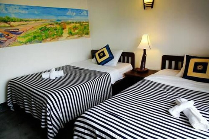 Imagen de la habitación del Hotel Uncle Sam Villa. Foto 30