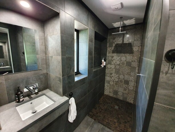 Imagen de la habitación del Hotel Under the Vines. Foto 5