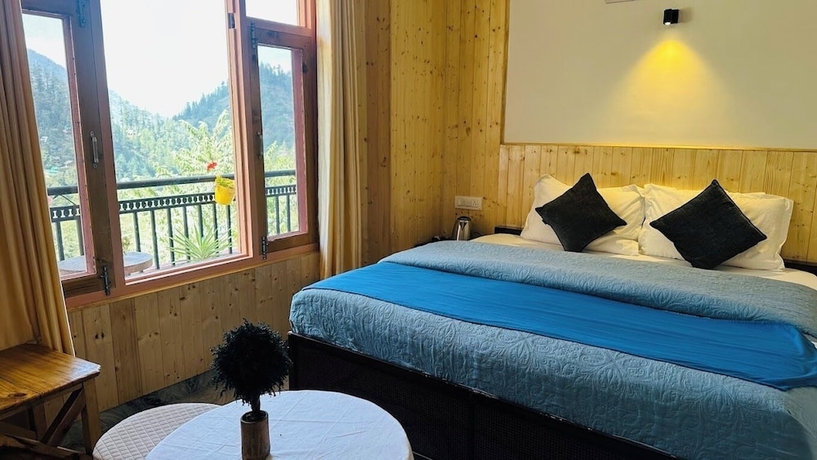Imagen de la habitación del Hotel Undiscovered Mountains. Foto 10