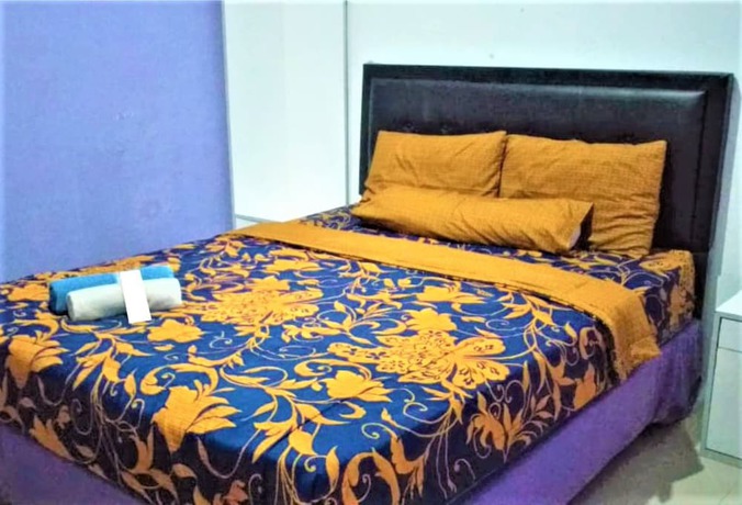 Imagen de la habitación del Hotel Ungu Cirebon. Foto 2