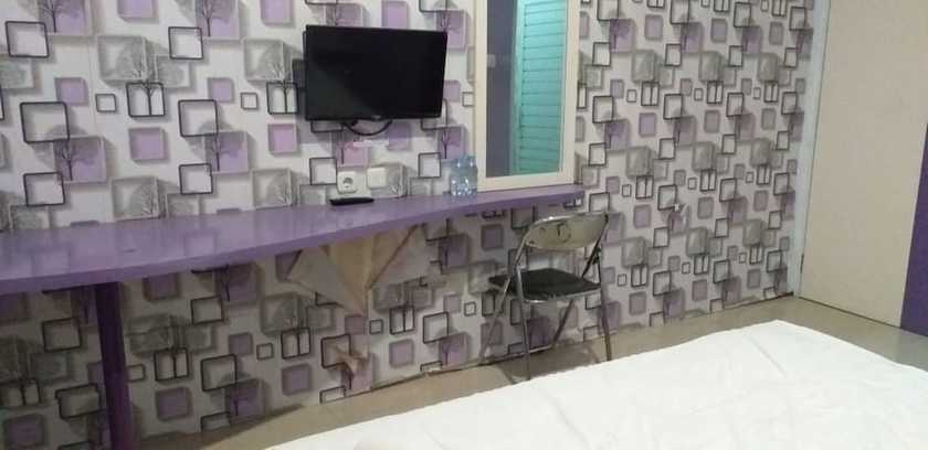 Imagen de la habitación del Hotel Ungu Cirebon. Foto 3