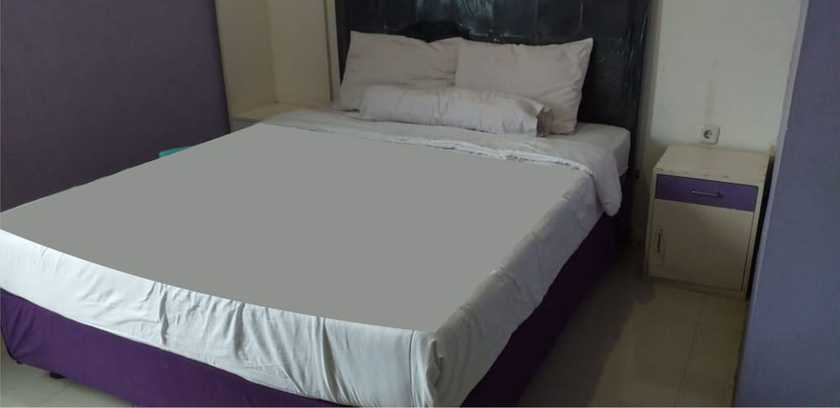 Imagen de la habitación del Hotel Ungu Cirebon. Foto 7