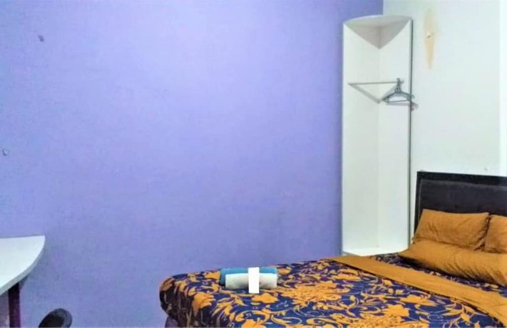 Imagen de la habitación del Hotel Ungu Cirebon. Foto 13