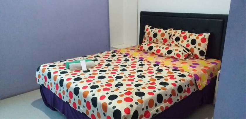 Imagen de la habitación del Hotel Ungu Cirebon. Foto 15
