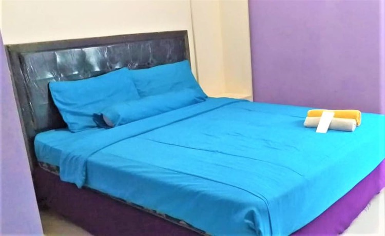 Imagen de la habitación del Hotel Ungu Cirebon. Foto 17