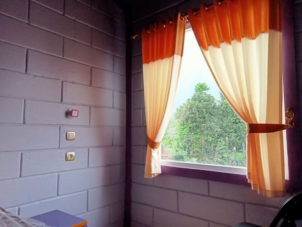 Imagen de la habitación del Hotel Ungu Garut. Foto 5