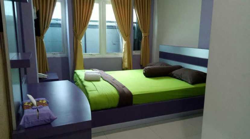Imagen de la habitación del Hotel Ungu Pas Kangen Bekasi. Foto 3