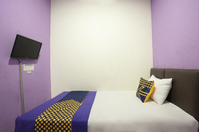 Imagen de la habitación del Hotel Ungu Residence Syariah. Foto 3