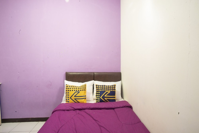 Imagen de la habitación del Hotel Ungu Residence Syariah. Foto 9