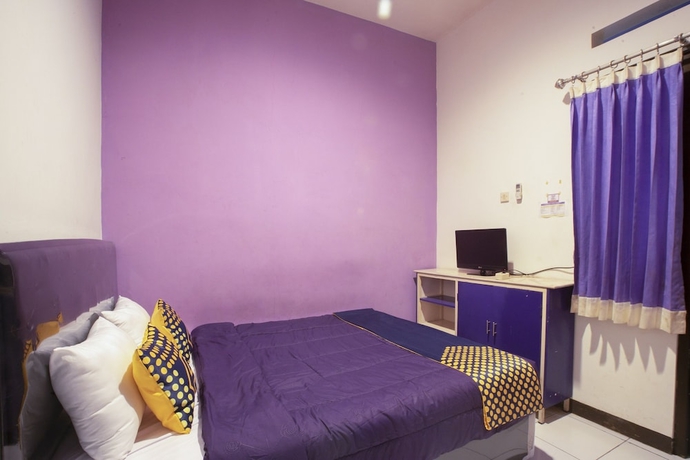 Imagen de la habitación del Hotel Ungu Residence Syariah. Foto 11
