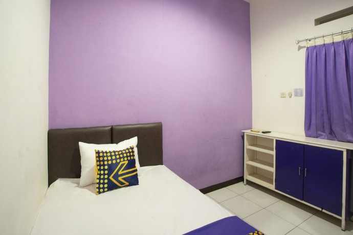 Imagen de la habitación del Hotel Ungu Residence Syariah. Foto 13