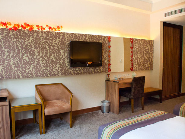 Imagen de la habitación del Hotel Uni Resort Ku-kuan. Foto 13