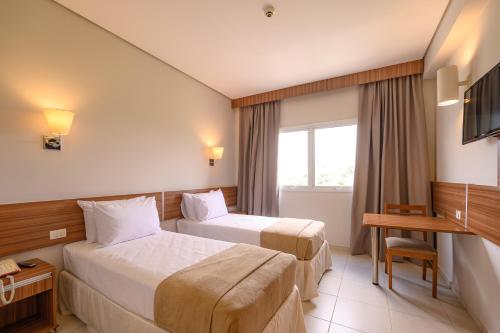 Imagen de la habitación del Hotel UniSalto. Foto 15