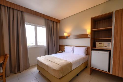 Imagen de la habitación del Hotel UniSalto. Foto 16