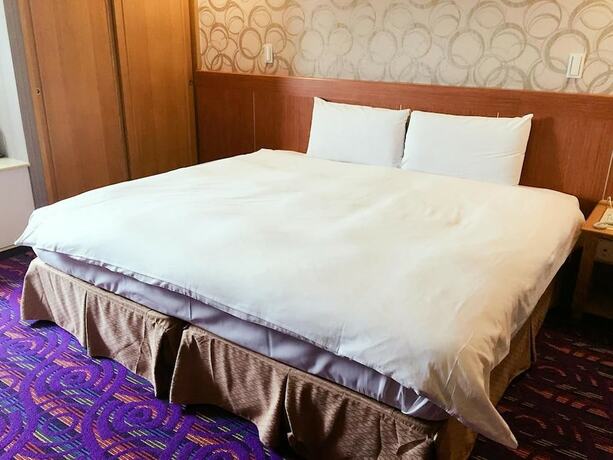 Imagen de la habitación del Hotel Unic, Chiayi City. Foto 5