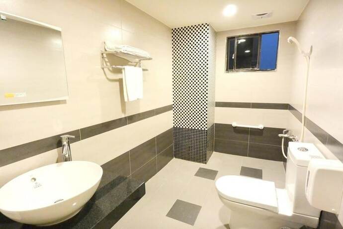 Imagen de la habitación del Hotel Unic, Chiayi City. Foto 8