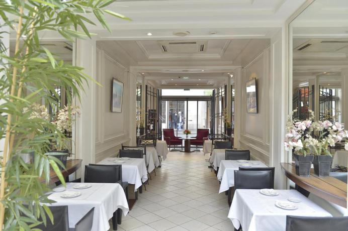 Imagen del bar/restaurante del Hotel Unic Renoir Saint Germain. Foto 2