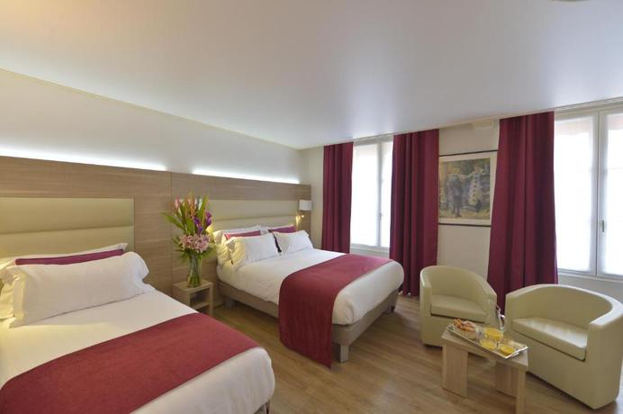 Imagen de la habitación del Hotel Unic Renoir Saint Germain. Foto 6