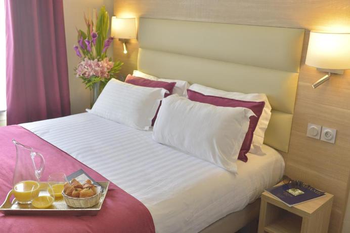 Imagen de la habitación del Hotel Unic Renoir Saint Germain. Foto 7