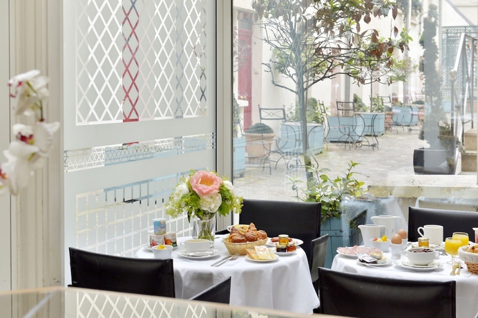 Imagen del bar/restaurante del Hotel Unic Renoir Saint Germain. Foto 3