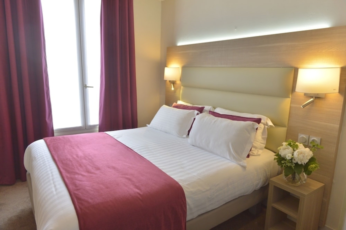 Imagen de la habitación del Hotel Unic Renoir Saint Germain. Foto 11