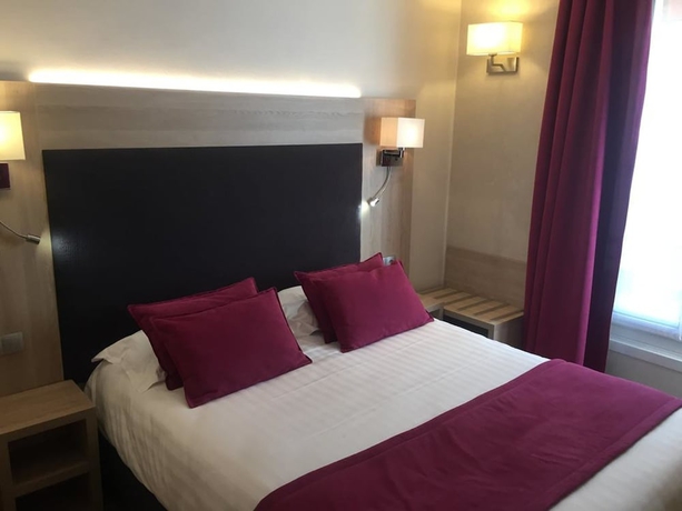 Imagen de la habitación del Hotel Unic Renoir Saint Germain. Foto 13