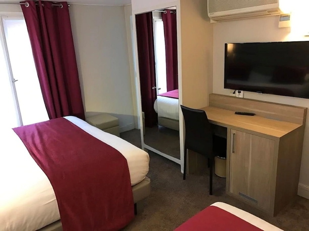 Imagen de la habitación del Hotel Unic Renoir Saint Germain. Foto 15