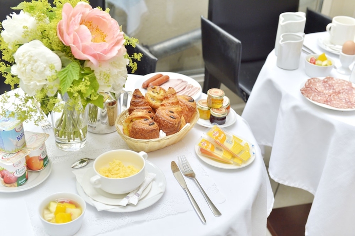 Imagen del bar/restaurante del Hotel Unic Renoir Saint Germain. Foto 6