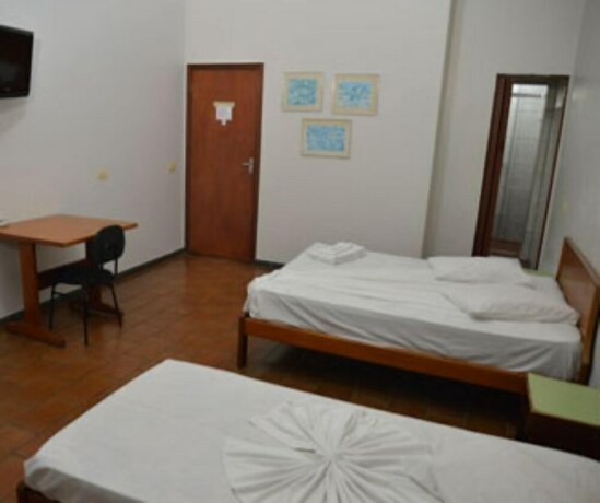 Imagen de la habitación del Hotel Unihotel. Foto 10